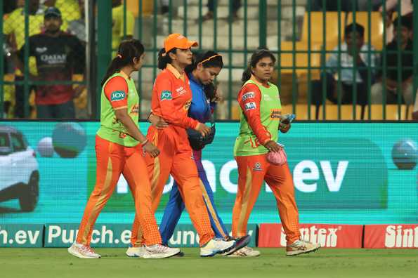 Harleen Deol helped off the field after suffering a knee injury in a game against UP Warriorz. Harleen Deol helped off the field after suffering a knee injury in a game against UP Warriorz.