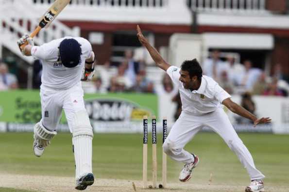Imran Tahir of South Africa (R) celebrates running out England's Graeme Swann (L) for 41 runs during day 5 of the third Test match between England and South Africa at Lord's. South Africa replaced England as the world's number one Test side as they held their nerve in a 51-run win. Imran Tahir of South Africa (R) celebrates running out England's Graeme Swann (L) for 41 runs during day 5 of the third Test match between England and South Africa at Lord's. South Africa replaced England as the world's number one Test side as they held their nerve in a 51-run win.