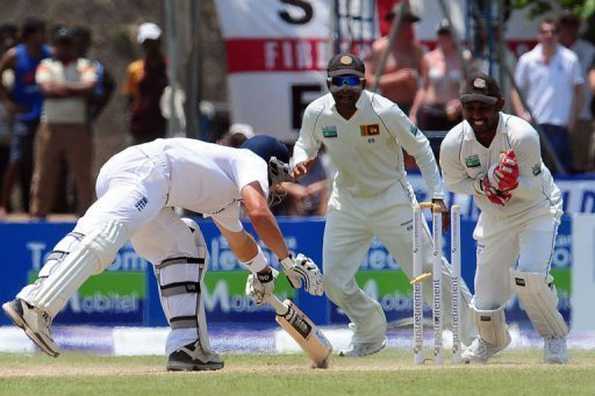 Sri Lanka wicketkeeper Prasanna Jayawardene (R) stumps England's Jonathan Trott (L) as Sri Lanka's captain Mahela Jayawardene looks on during the second day of the first Test in Galle on March 27, 2012. England bounced back after being spun out cheaply by Sri Lanka to leave the first cricket Test evenly poised at stumps. Sri Lanka wicketkeeper Prasanna Jayawardene (R) stumps England's Jonathan Trott (L) as Sri Lanka's captain Mahela Jayawardene looks on during the second day of the first Test in Galle on March 27, 2012. England bounced back after being spun out cheaply by Sri Lanka to leave the first cricket Test evenly poised at stumps.
