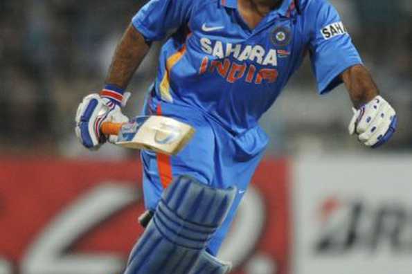 Indian cricket captain Mahendra Singh Dhoni completes a run during the only Twenty20 match between India and England at The Eden Gardens in Kolkata. England defeated India by six wickets. Indian cricket captain Mahendra Singh Dhoni completes a run during the only Twenty20 match between India and England at The Eden Gardens in Kolkata. England defeated India by six wickets.