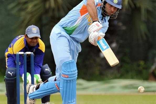 Indian cricketer Yuvraj Singh (right) watches the ball after playing a stroke during the One Day practice match between Indian and Sri Lankan XI team in Colombo. Singh geared up for the one-day series against Sri Lanka with an explosive 172 to power India to a comfortable 92-run victory in a practice match. Indian cricketer Yuvraj Singh (right) watches the ball after playing a stroke during the One Day practice match between Indian and Sri Lankan XI team in Colombo. Singh geared up for the one-day series against Sri Lanka with an explosive 172 to power India to a comfortable 92-run victory in a practice match.